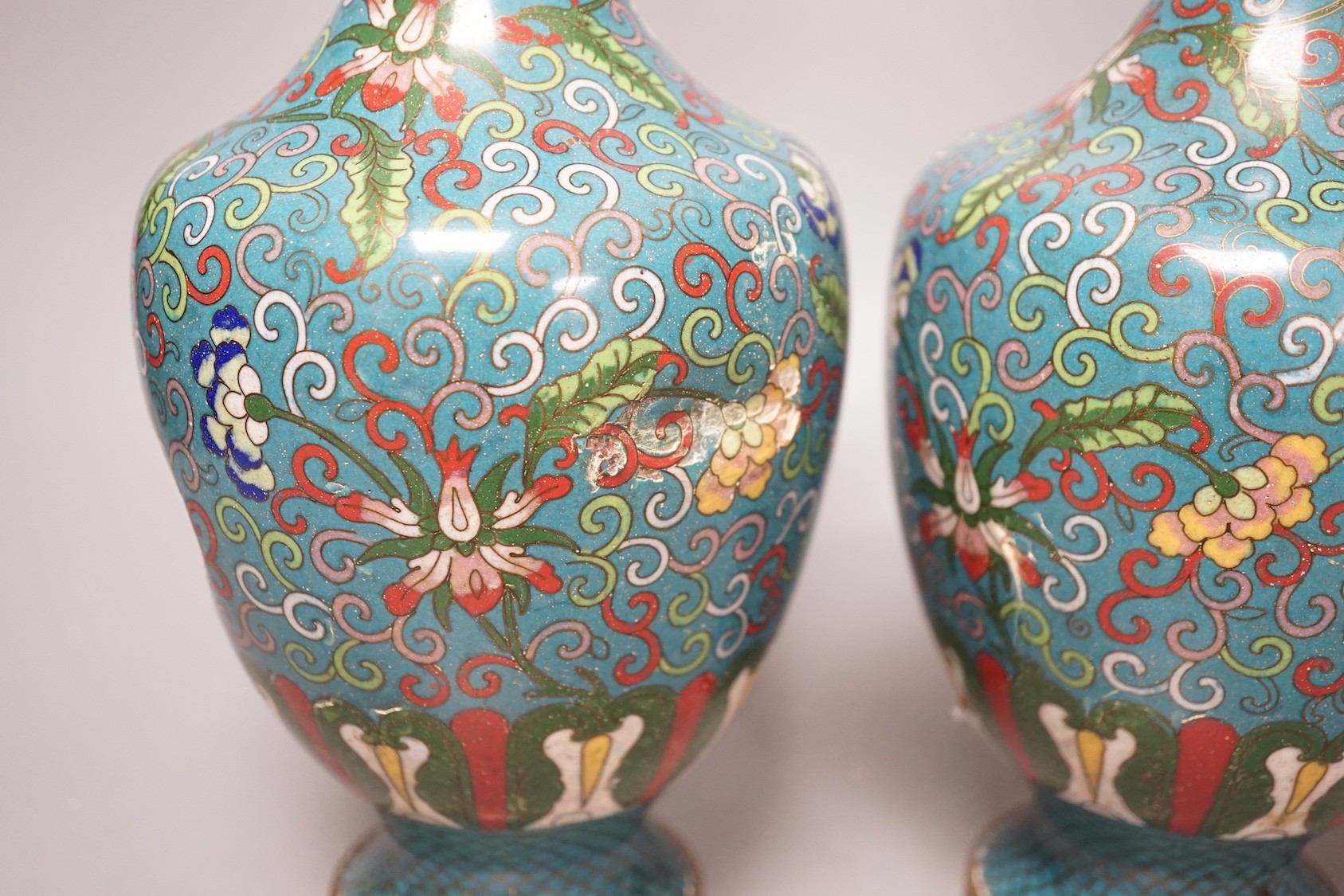 A pair of early 20th century Chinese cloisonné enamel vases - 25cm tall
